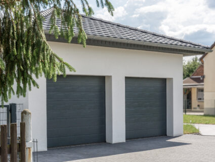double garage with two sectional garage doors in grey