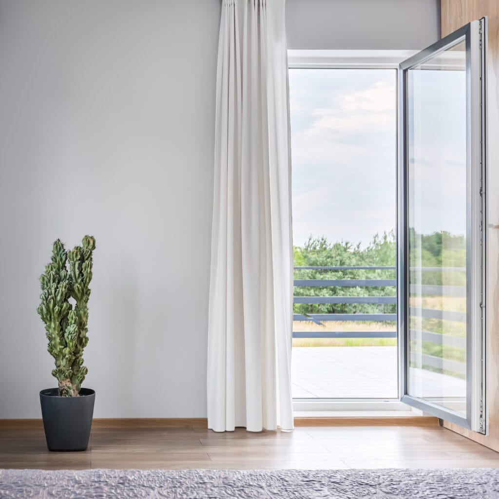 white single residential doors leading to a terrace