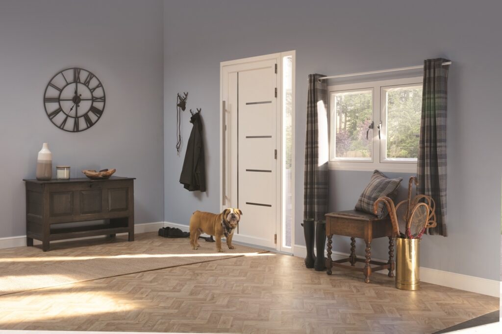 white origin front door in a room with a dog by the door